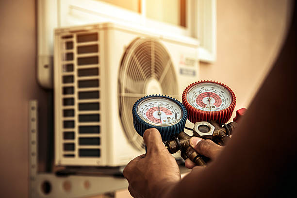 Professional Hvac technician working in Choccolocco, AL